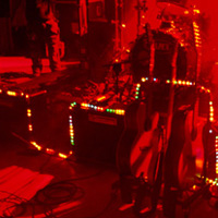 Christmas lights on amps and guitar stand